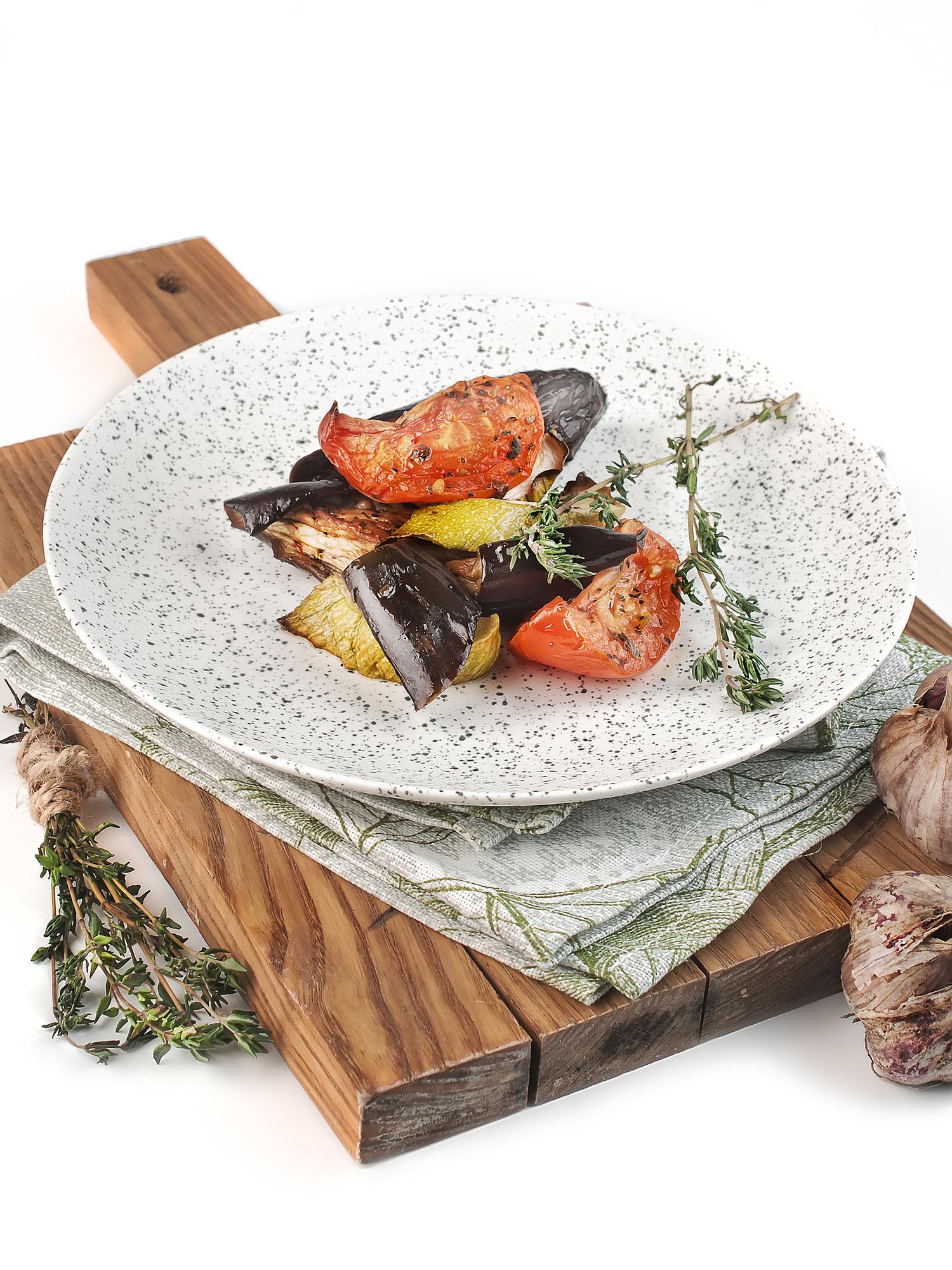 Finished main course on rustic table setting